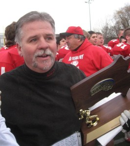AHS head coach Thom Connors with Super Bowl trophy