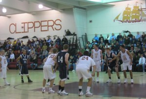 A lively crowd abandons TVs and computers for an evening of high school basketball on December 16th at NHS.  The Clippers defeated Triton, 63-57