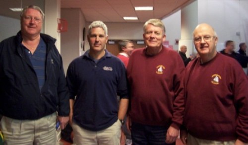 newburyport-stat-crew-1-5-09 Paul Coleman, Peter Murray, Pete Carlson, and Tom O'Brien pose before another NHS home basketball game.