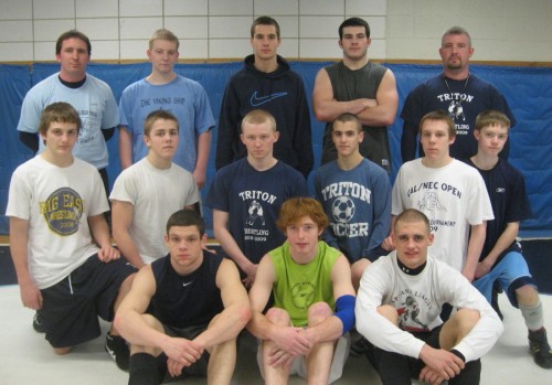 Triton westling team with Coach Shawn McElligott at the top left