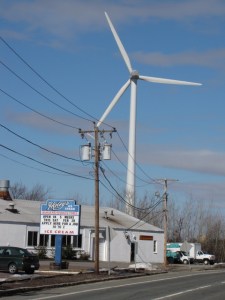 A 292-foot wind turbine, that only a visually-impaired environmentalist could love, looms large over Route One in Newburyport.