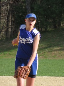 Sarah Erlandson with ball in back 4-29-09 Sophomore ace Sarah Erlandson prepares to let one fly.