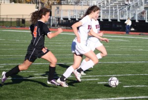 ipswes soc Madeline Linde dribbles for second goal 11-13-10