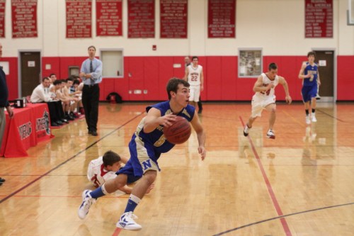nepo B1 Mike Daubert (5) heads for basket after steal
