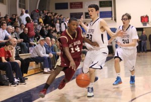 bost A8 Owen Marchetti (23) and Tyler Dooley (34) chase Charles Collins (14)