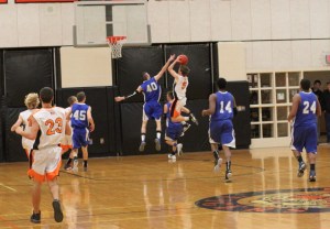 geip A7 Dan OFlynn drives - Matt Gott (40) defends