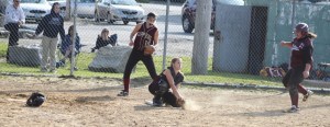 rone A6 Catcher Lauren Singer handles the throw as Kayla Parisi approaches