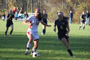 lyam A2 Amanda Martin (12) tries to get past Ali Johnson (5)