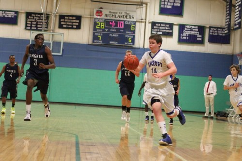 Luke Alley (14) heads for the hoop with Alonzo Jackson (3) closing fast