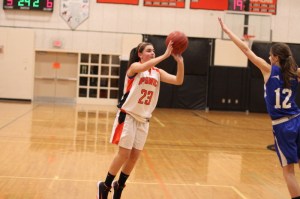 Freshman Jenna Gagnon (17 points) puts up a long one