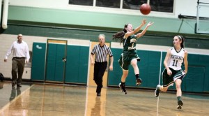 Carly Swartz (11 points) launches a last-second shot