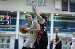 Ashlee Ruzicka (12 points) looks to the hoop