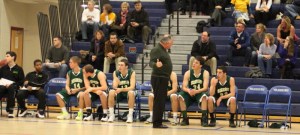 Coach Jim Migneault instructs