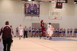 Fred Hogan (21 points) gets a three at the buzzer