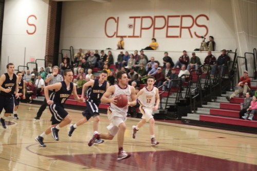 Colton Fontaine (twenty points and twelve rebounds) breaks away in overtime