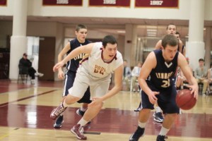 Clipper John Baribeault (six points in OT) sees a possible turnover