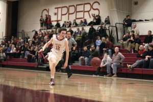 Freshman Dan Baribeault chases a loose ball