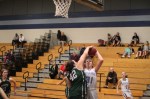 Sam Taylor blocks the shot of Harley Wood