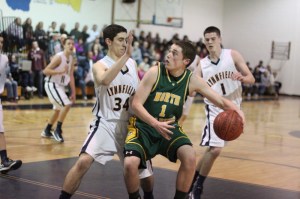 Mike OBrien (13 points) looks for an opening against Paul Pasciuto