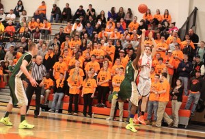 Nick Cross (22 points) fires from the corner