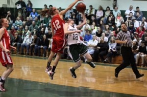 Hannah Kiernan blocks the shot of Kelsi McNamara