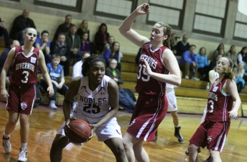 Kat Fogarty (27 points) looks to block the shot of Alexandra Maund (15 points)