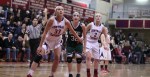 Casey McLaughlin, Tess Nogueira, and Courtney Walsh look for a rebound