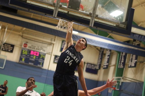 Freshman Justin Assad (26 points) dunked twice against Winchendon