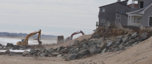Cranes being used on Plum Island to restore the oceanfront dunes.