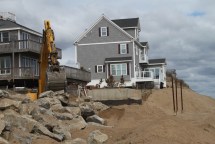 side view of home being moved back