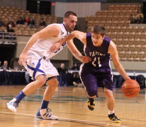 Mat Sulda (11 points) tries to get by Nick McKenna (20 points)