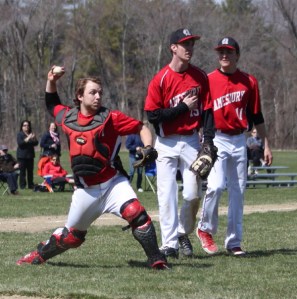 Catcher Mac Short fires to first