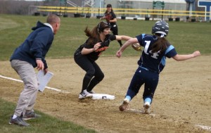 Ashley Shute picked off third by Kaycee Lemorosky as Triton coach Jim Hounam looks on