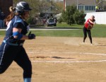 Shortstop Amanda Schell fires to first