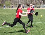 Lauren Fedorchak and Jenn Bartley chase a foul ball