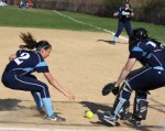 Rylee Culverwell and Julia Hartman pursue a bunt