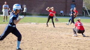 Autumn Kligerman prepares to throw to first during the Vikings 3-run sixth inning
