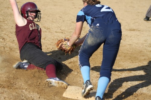 Vicki Allman reaches third in the seventh inning after a 2-out, 3-run triple to tie the score.