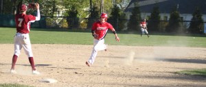 John Pesci reaches third as Tommy Connors single heads for centerfielder Ian Michaels