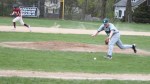 Brandon Bartlett chases a bunt as Colby Morris runs for second