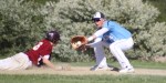 Colby Morris slides back to first as Adam Chatterton waits to apply the tag