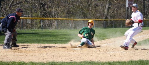 Ryan McAuliffe scores on a wild pitch