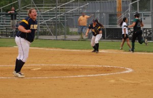 Pitcher Brooke LAbbe cheers as the fourth inning ends with a double play