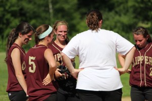 NHS coach Lori Solazzo visits the mound