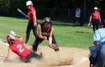 Jenna Bartley scores the sisth run for Amesbury on a wild pitch