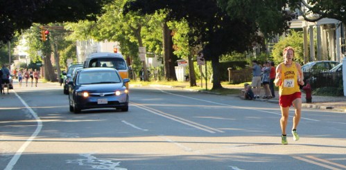 Pat Fullerton runs alone at one-mile mark
