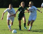 Emily Brengle and Sydney Law try to contain Bridgett Kiernan