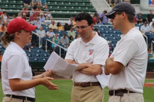 Media boss Chris Cameron in the middle