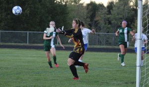 Isobel Scribner reaches for a Laker save