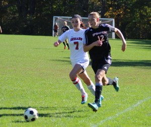Kelly DiFazio (7) runs with Devin Smith (12)